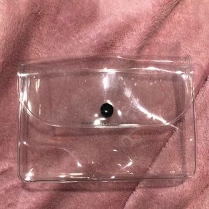 NWOT clear vinyl makeup bag